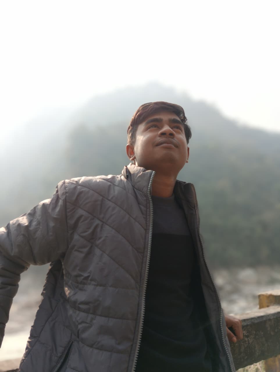 Sikkim sunrise with rolling clouds over the mountains